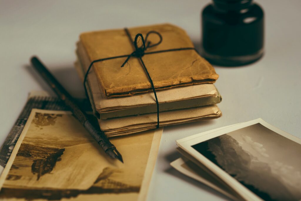 ABOUT US 2 Old book & Pen